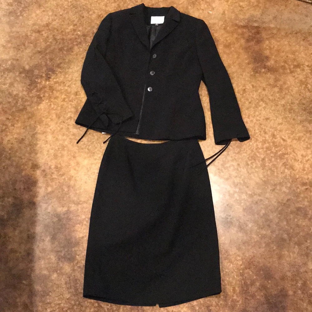 Black skirt with suit jacket.